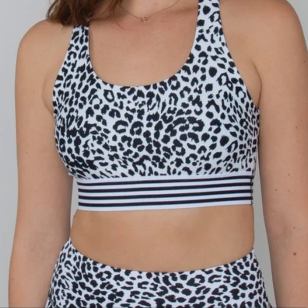 ALL FENIX white leopard sports bra